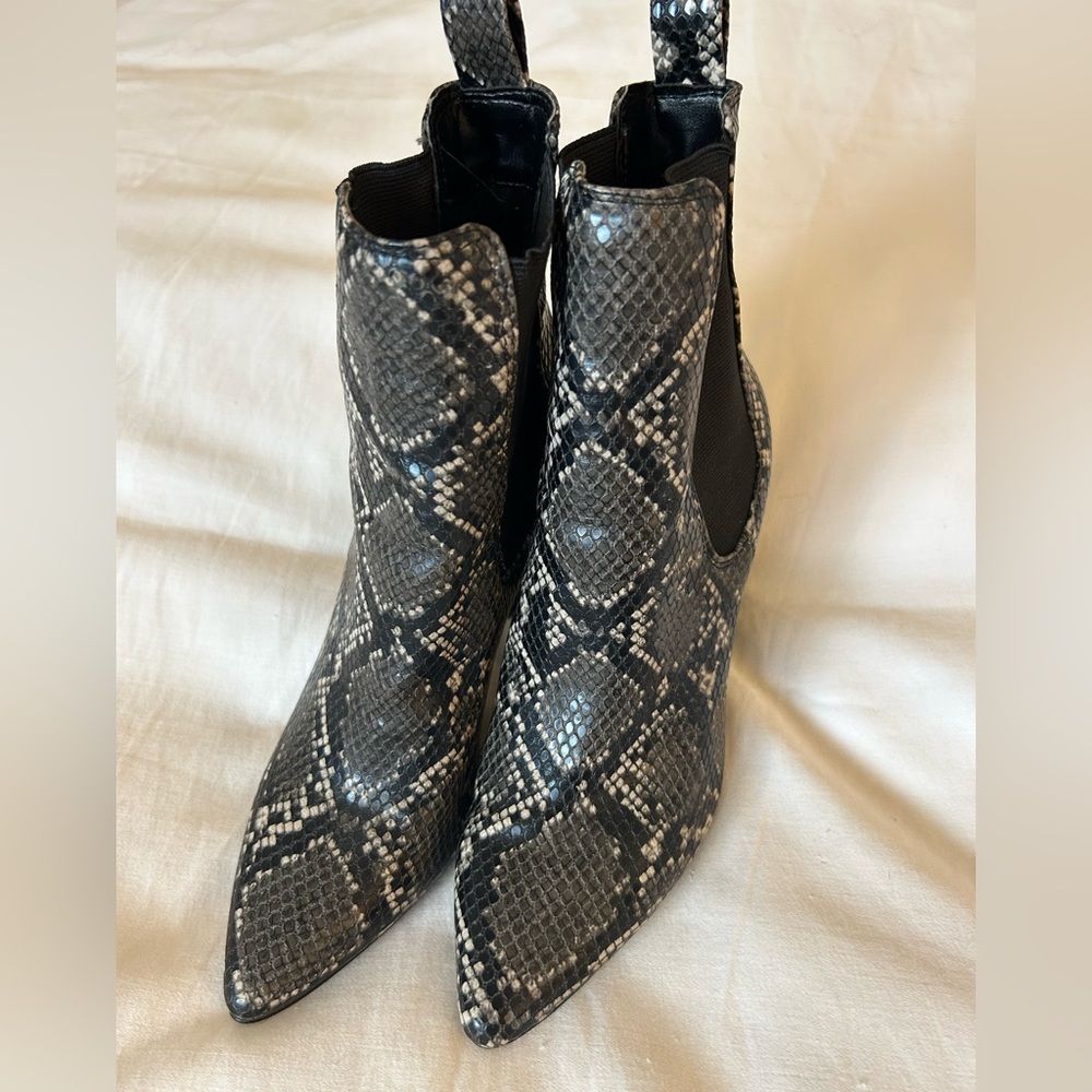 Animal print boots, gently worn.  Stacked heels, comfortable.